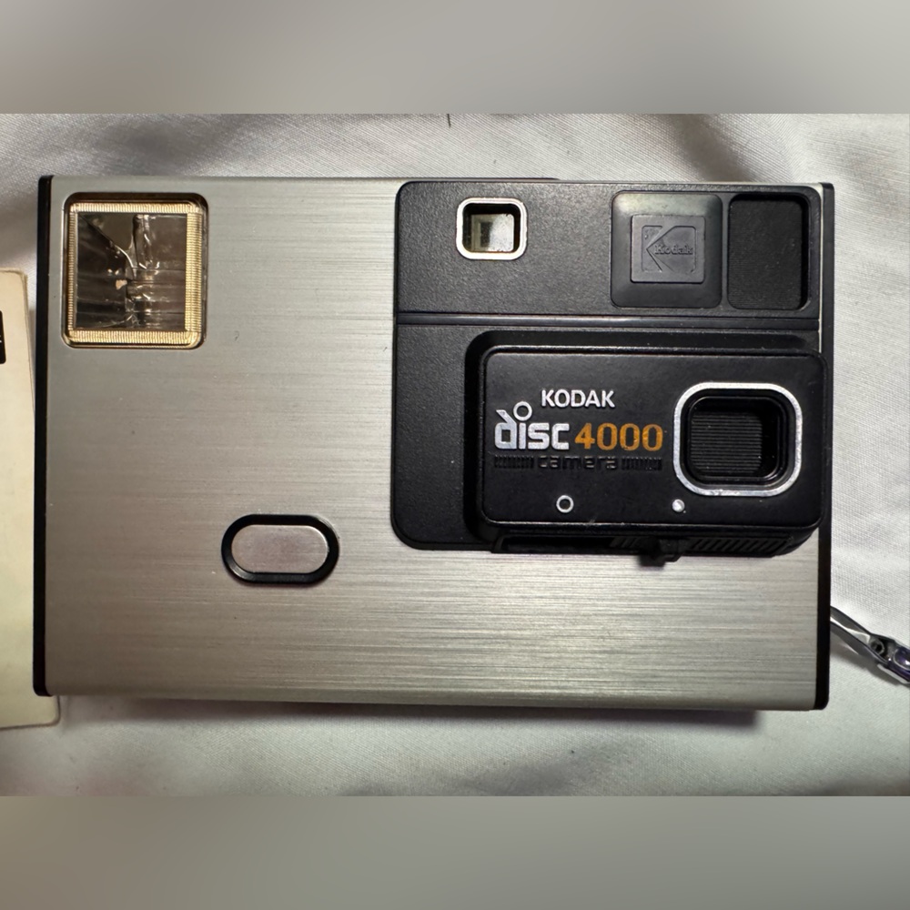 Kodak Disc 4000 Camera - including one unused disk and one disk inside the camer